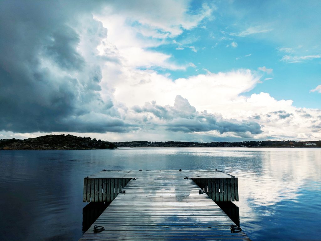 still lake blue sky white clouds