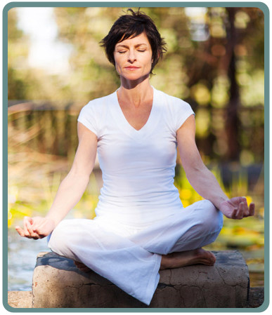 Woman meditating peacefully - learn to meditate online