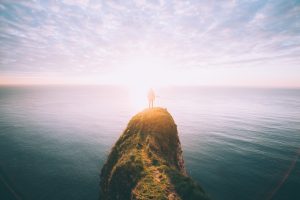 man meditates alone